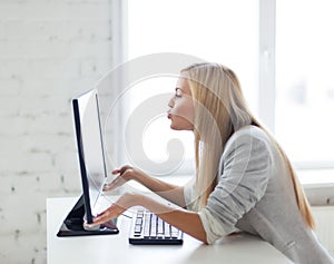 Happy woman with laptop computer