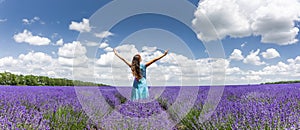 Happy woman in a lavender field