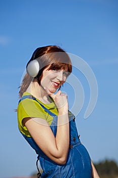 Happy woman listen music