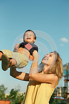 Happy woman with little male child