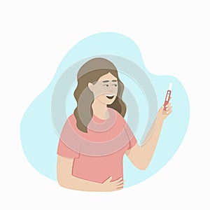 Happy woman looking at positive pregnancy test result