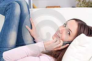 Happy woman making a phone call