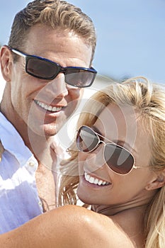 Happy Woman Man Couple In Sunglasses At Beach