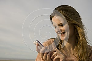 Happy woman with mobile