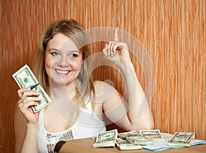 Happy woman with money