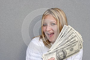 Happy woman with money photo