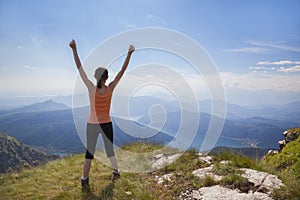 Happy woman on mountain top