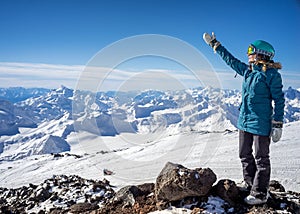 Happy woman in the mountains