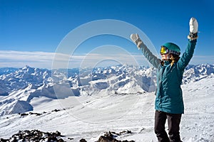 Happy woman in the mountains