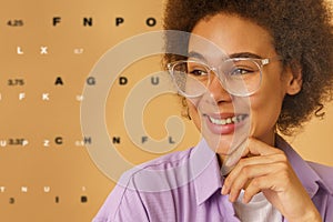 Happy woman with new eyeglasses to fix poor eyesight