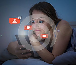 Happy woman online chatting and dating on smartphone with social media notification icons at nigh