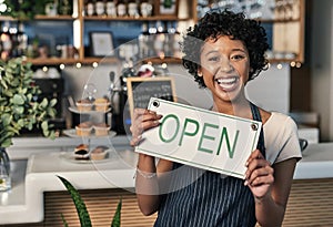 Happy woman, open sign and portrait of waitress at cafe in small business, morning or ready to serve. Female person