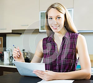 Happy woman with papers