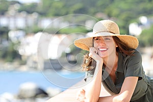 Happy woman with perfect smile on the beach
