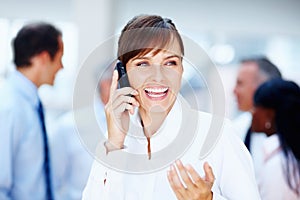 Happy woman, phone call and laughing for funny joke, communication or networking at office. Female person or business