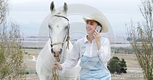 Happy woman, phone call and walking horse outdoor for discussion or communication in the countryside. Female person