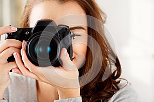 Happy, woman and photographer with hands and digital camera for photoshoot with creative artist. Young, female person