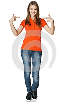 Happy woman pointing at herself standing in full length