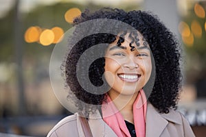 Happy woman, portrait and city travel with a smile while outdoor on London street with freedom. Face of young black