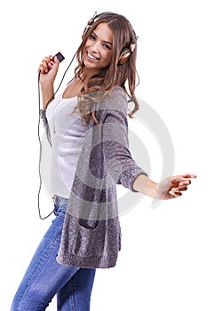 Happy woman, portrait and headphones with radio for music or dancing on a white studio background. Face of young female