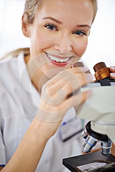 Happy woman, portrait and microscope with test for laboratory research, scientific exam or discovery. Face of female