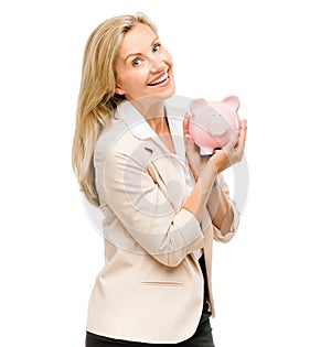 Happy woman, portrait and piggy bank for money investment, savings or loan isolated on a white studio background