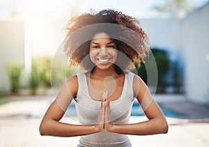 Happy woman, portrait and yoga in meditation for zen, spiritual wellness or healthy exercise outdoors. Calm African