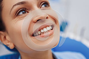 Happy woman preparing for dental treatment