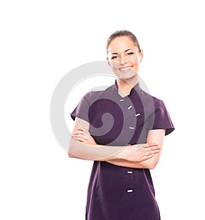 A happy woman in a purple uniform on white