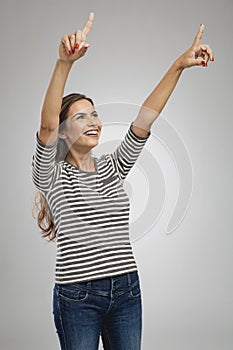 Happy woman raised hands