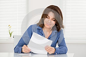 Happy Woman Reading Letter