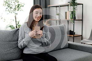 Happy woman receiving letter