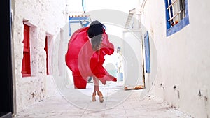 Happy woman in red dress