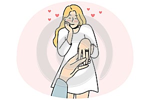 Happy woman with ring on finger