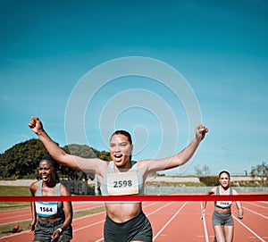 Happy woman, running and winning by finish line in competition, race or marathon on outdoor stadium track. Person or