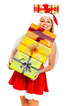 Happy woman in Santa costume with Christmas gifts