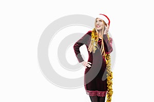 Happy woman in santa hat and dress, celebrating new year, with t