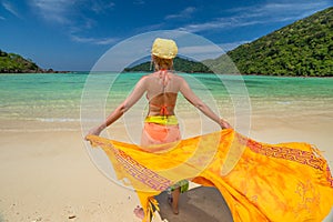 Happy woman with sarong photo