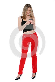 Happy woman sending a text message