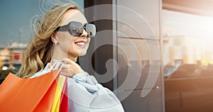 Happy Woman with Shopping Bags