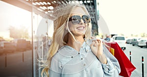 Happy woman with shopping bags