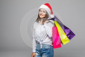 Happy woman with shopping bags. Sales. christmas gifts. Christmas shopping girl isolated on ghite background. Christmas gift.