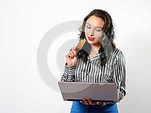 Happy Woman shopping online with credit card and computer.Internet Shopping