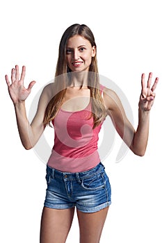 Happy woman in shorts showing eight fingers