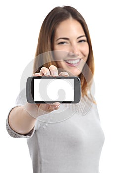 Happy woman showing a horizontal smart phone screen app