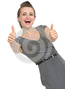 Happy woman showing thumbs up isolated