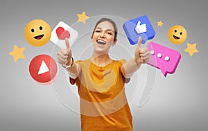 happy woman showing thumbs up over internet icons