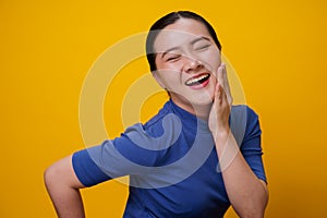 Happy woman showing toothy smile