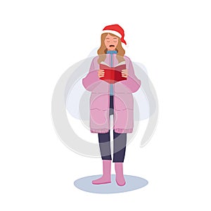 Happy woman Singing Christmas Song in Winter Costumes. woman in Festive Winter Attire Singing Christmas Carols