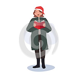 Happy woman Singing Christmas Song in Winter Costumes. woman in Festive Winter Attire Singing Christmas Carols